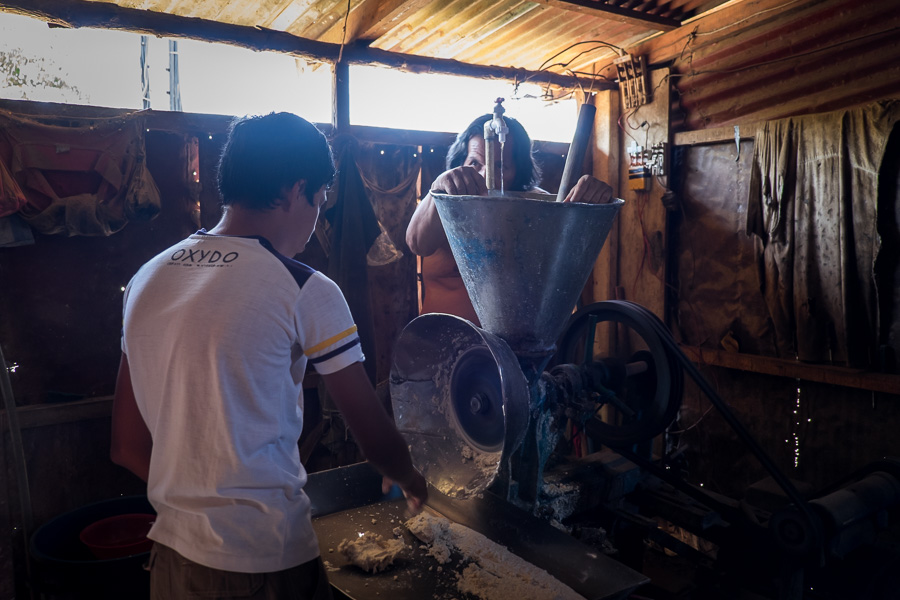 NicaAsi Cooking Workshop grinding corn to make masa