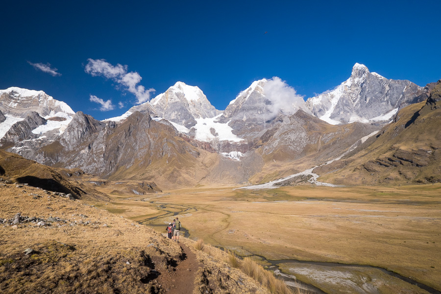 Hiking along the side of Laguna Carhuacocha - Cordillera Huayhuash