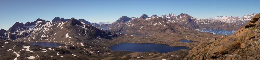 Panorama of lakes, the Flower Valley and the Tasiilaq Fjord from most of the way up Qaqqartivakajik mountain, East Greenland