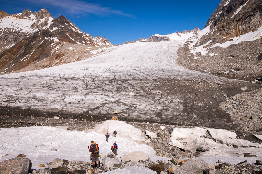 My trekking companions approach the glacier tongue that we had to cross in the Tasiilap Nua Valley. The glacier looks like a runway.