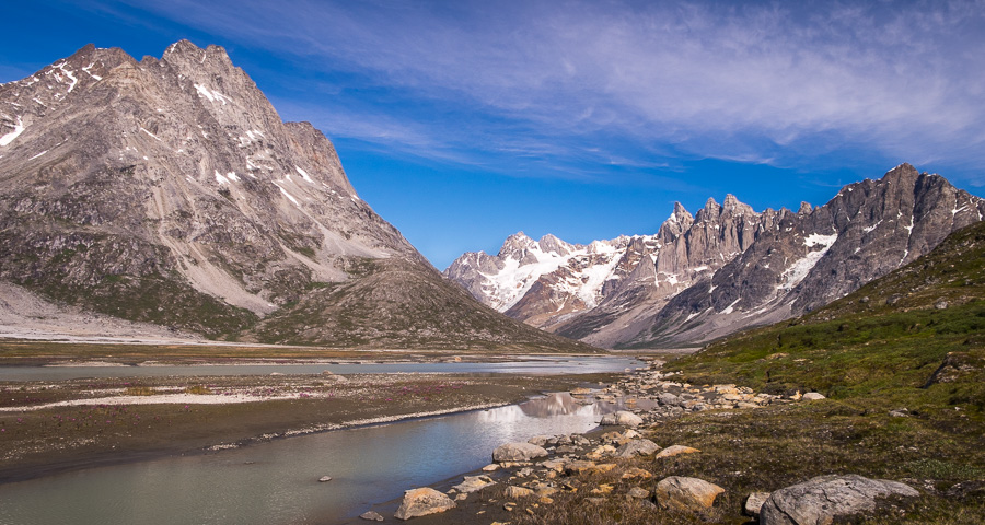 Blue skies overseeing the Tasilap Kua Valley and "The Triplets" that mark the end of the Tasiilaq Fjord