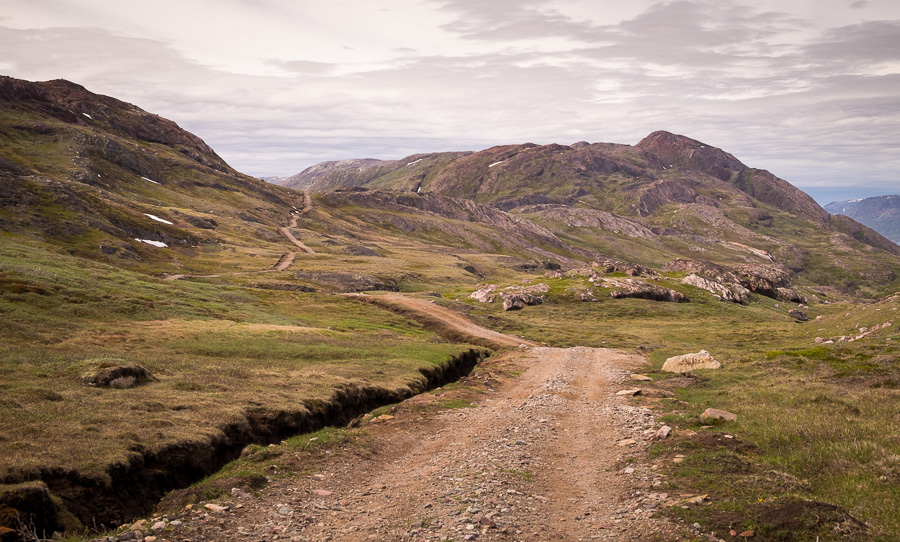 The dirt farm road that the Waterfall Hike near Igaliku in South Greenland follows initially