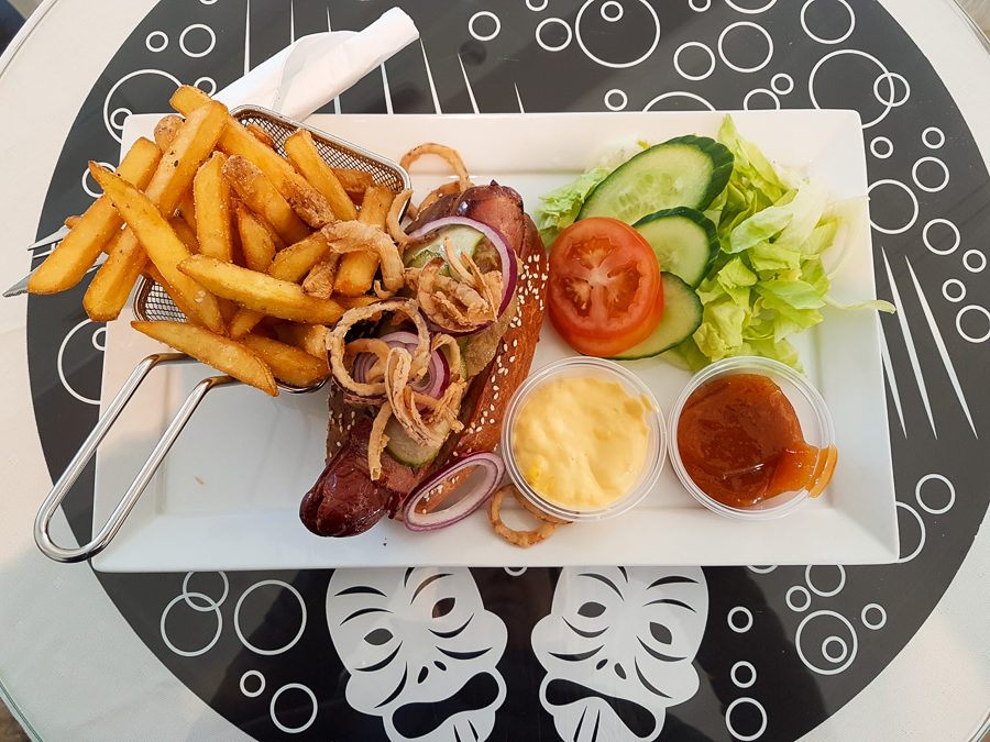 Musk Ox Hotdog with chips and salad at the Katuaq Cultural Centre in Nuuk, Greenland