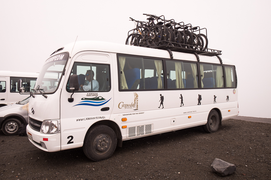 The CarpeDM minibus with mountain bikes loaded for the Cotopaxi day tour in Ecuador