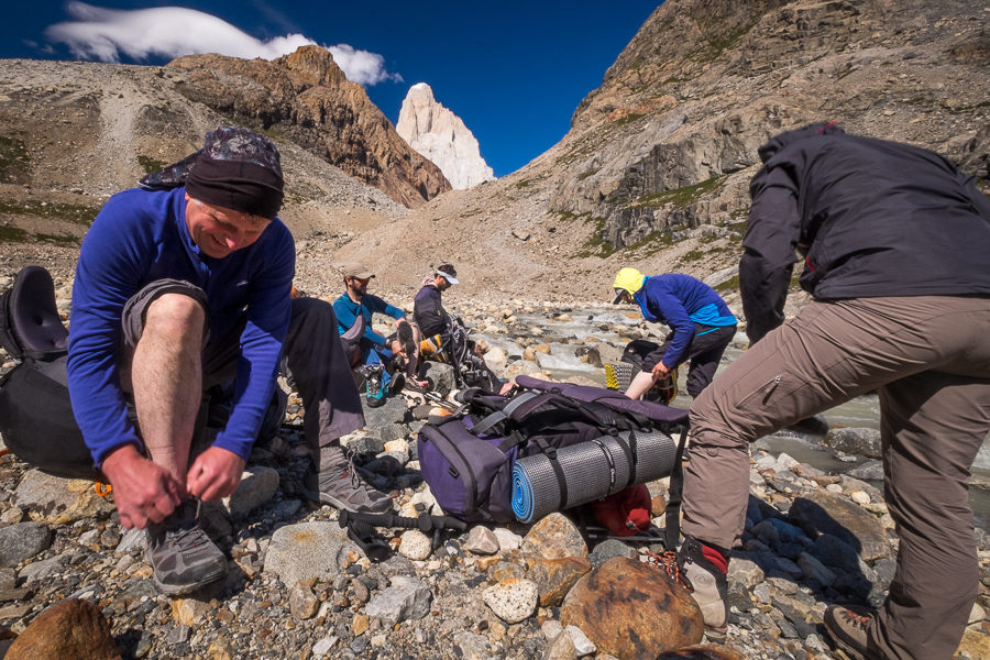 Trekking companions changing shoes - South Patagonia Icefield - Argentina