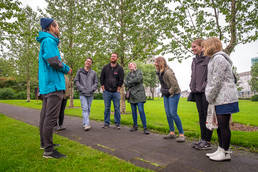 Stefan telling stories in the park near Landakotskirkja on the Icelandic Mythical walk by Your Friend in Reykjavik