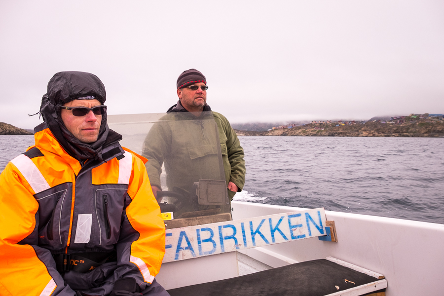 My friend in a freezer suit sitting in front of Jan with just a normal jacket on - Sisimiut Boat Safari - West Greenland