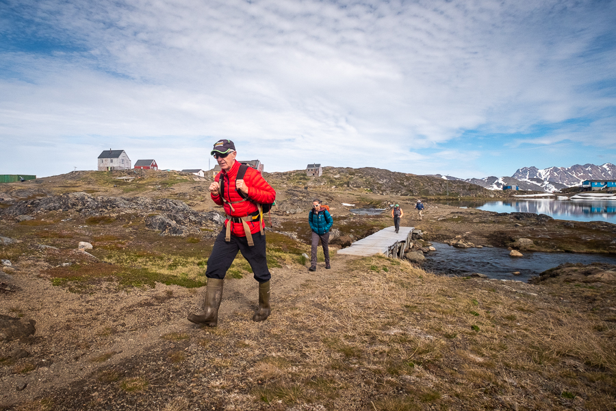 Hiking companions crossing the bridge at the start of the hike to DYE-4 - Kulusuk Island - East Greenland