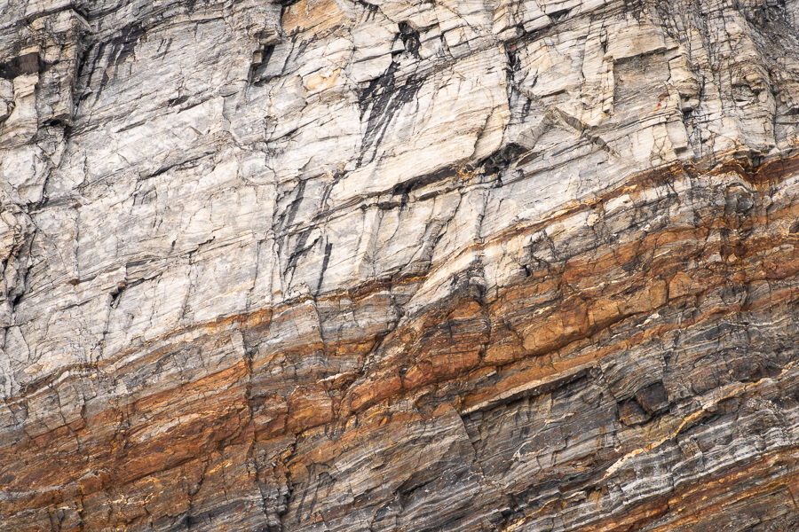 Rock face as we climb Mt Kuummiut in East Greenland