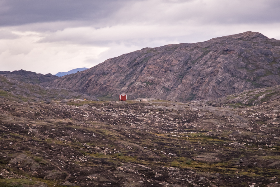 The Ikkattooq Hut surrounded by burned vegetation - Arctic Circle Trail - West Greenland