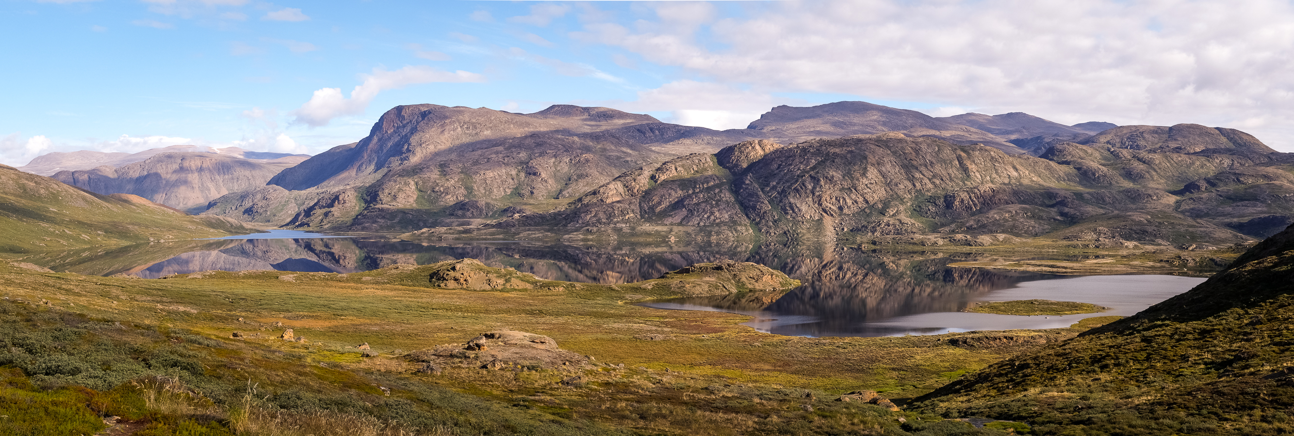 Perfect reflections of mountains in the lake - Arctic Circle Trail - West Greenland