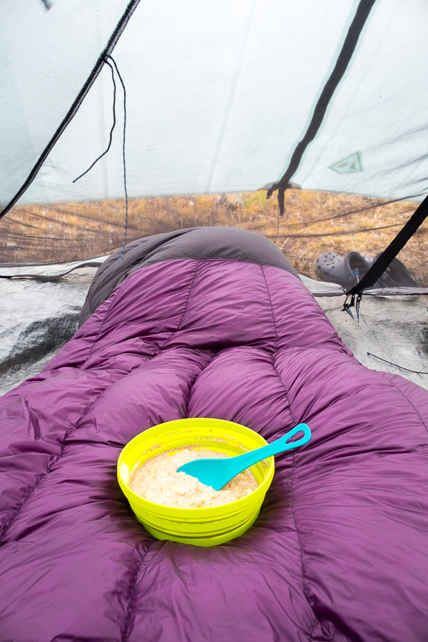 My sleeping quilt and bowl of porridge in Tyson's tent - - Arctic Circle Trail - West Greenland