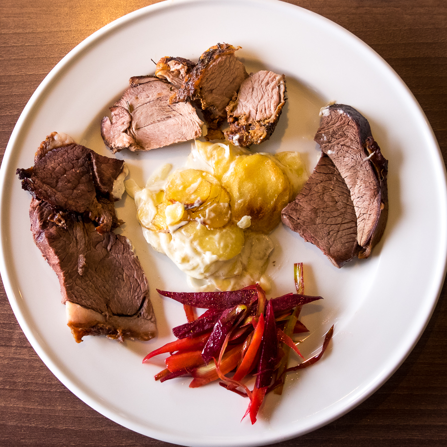 My plate with the different meats from land animals at theTraditional Greenlandic Buffet at the Hotel Sisimiut - West Greenland