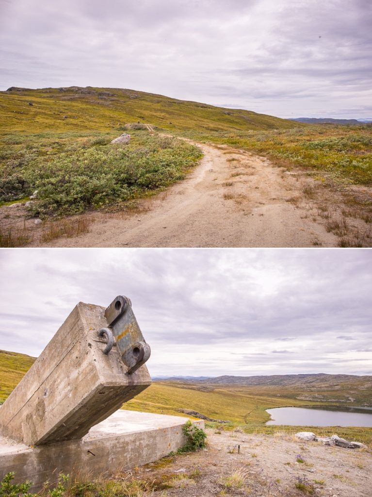 Road out to Kelly Ville and concrete plinth that marks the start of the Arctic Circle Trail near Kangerlussuaq, West Greenland