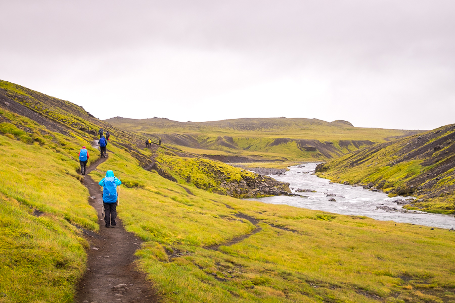 Hiking along the trail beside the river on Day 7- Laugavegur Fimmvörðuháls Trail - Icelandic Highlands