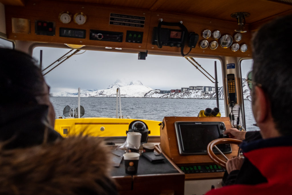 Looking out the windscreen of our boat towards Sermitsiaq mountain with its top lost in cloud - Nuuk - West Greenland