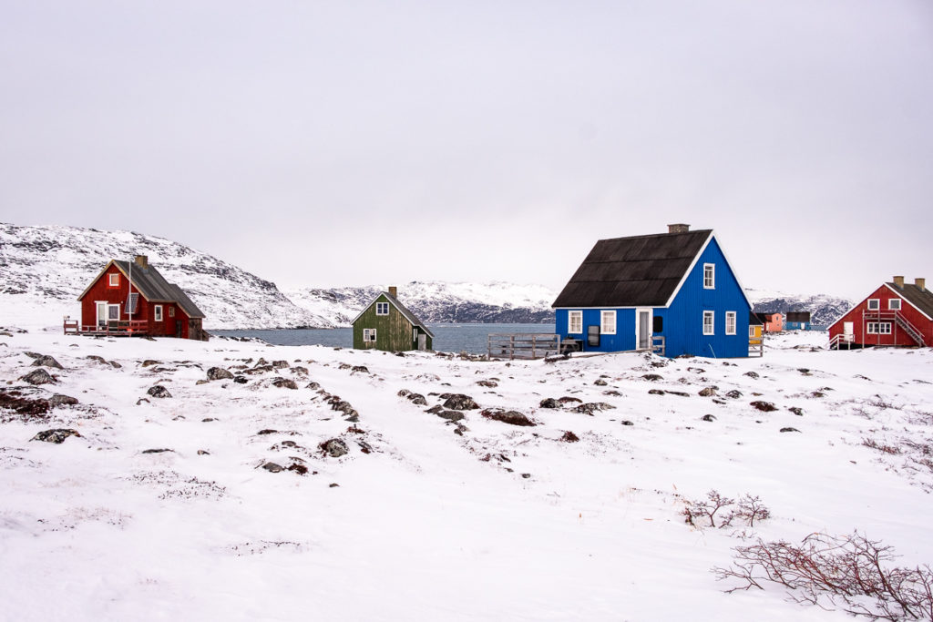 Colourful houses of Qoornoq and a path leading through the settlement - West Greenland