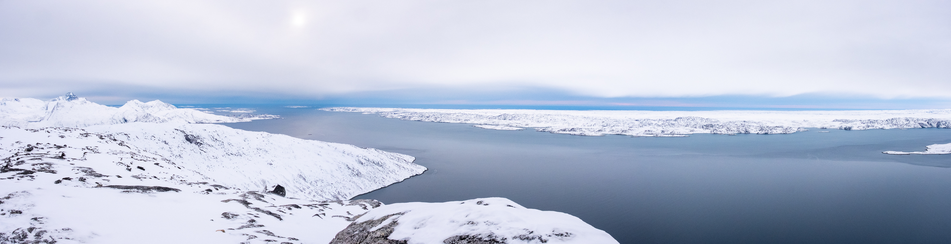 Panorama of the Nuuk Fjord leading down towards Nuuk on the helicopter summit flight, Greenland
