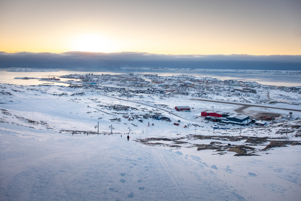 Looking down the main run of Nuuk's downhill skiing centre with a view over the city and the fjord - Nuuk - West Greenland