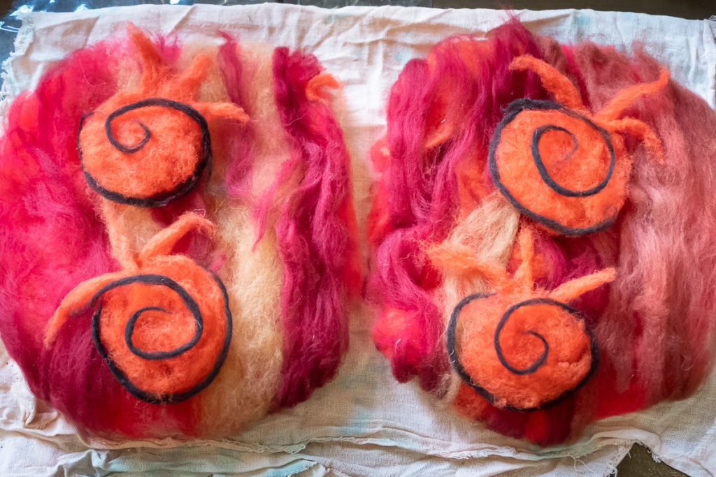 Gulmira's final wool mat ready for felting - felt workshop - Bishkek