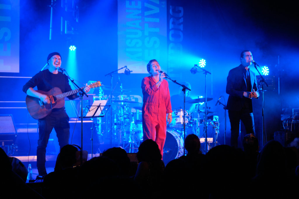 Adam, Kimmernaq and Nathan performing at the Akisuanerit Festival in Nuuk, 2019