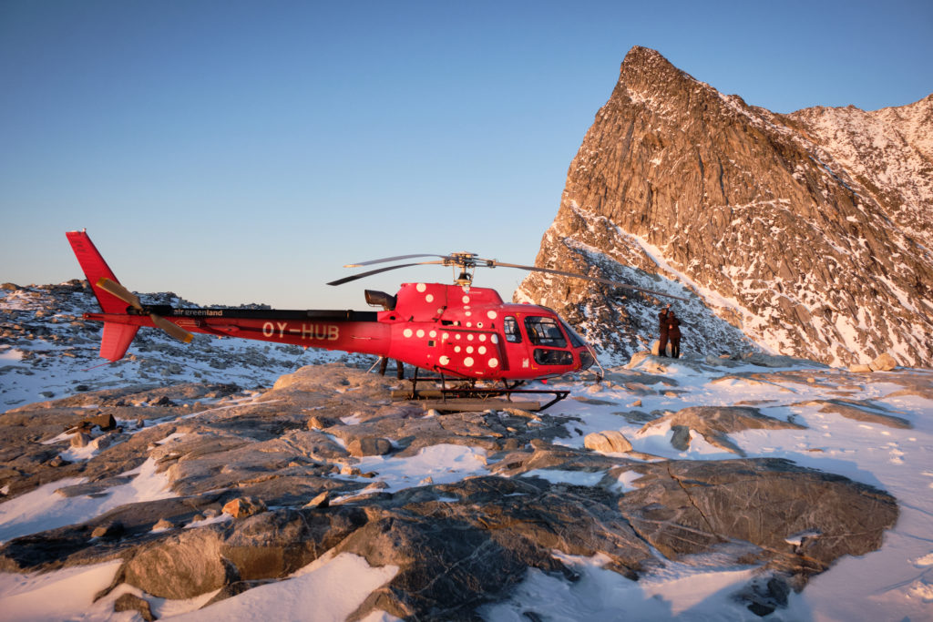 helicopter and people on the ridge in front of the summit of Sermitsiaq - Nuuk - West Greenland