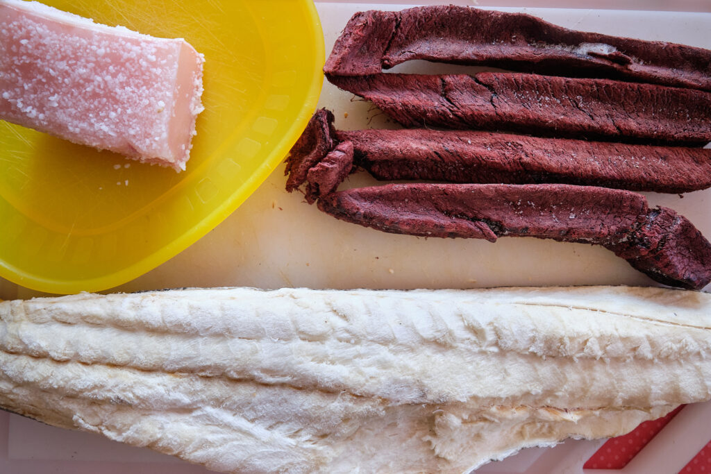 salted whale blubber, dried Minke whale meat and dried cod for lunch at Sassannguit near sisimiut - Greenland