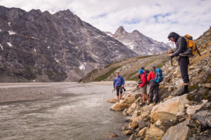 Maxime and some of the trekking group preparing to cross the river