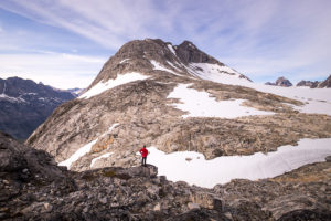 Maxime contemplating the mountain that sits behind the Tasiilaq Mountain Hut