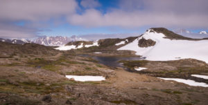 Small lake and general landscape. Seen while hiking from Kulusuk to Isikajia, East Greenland