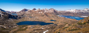 Panorama of lakes, the Flower Valley and the Tasiilaq Fjord from most of the way up Qaqqartivakajik mountain, East Greenland