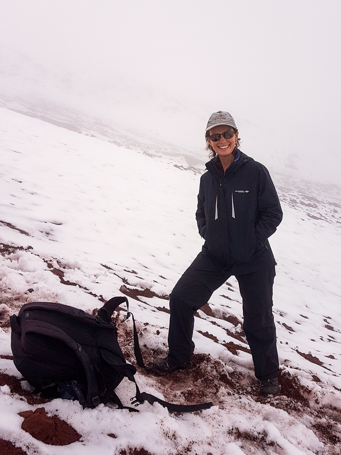 Me posing at the edge of the Cotopaxi Glacier in Ecuador