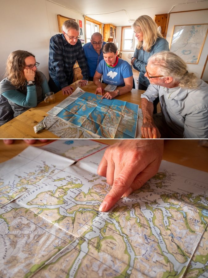 Our guide explaining the plan for the next day using the map of Kulusuk Island - East Greenland