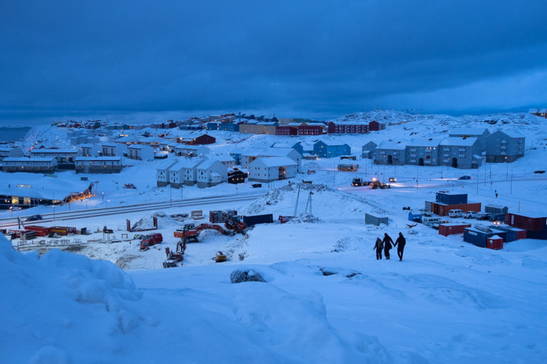 View down the snowy hill near my apartment block - locals leading the way to the harbour - Nuuk - Greenland