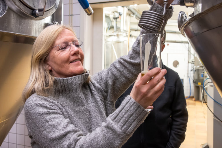 Pouring our own beer from the fermentation tanks at the Godthaab Bryghus in Nuuk - West Greenland