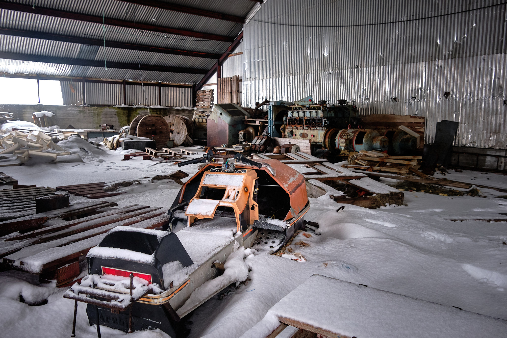 Inside fish factory snowmobile - Nordafar Abandoned fish factory near Nuuk