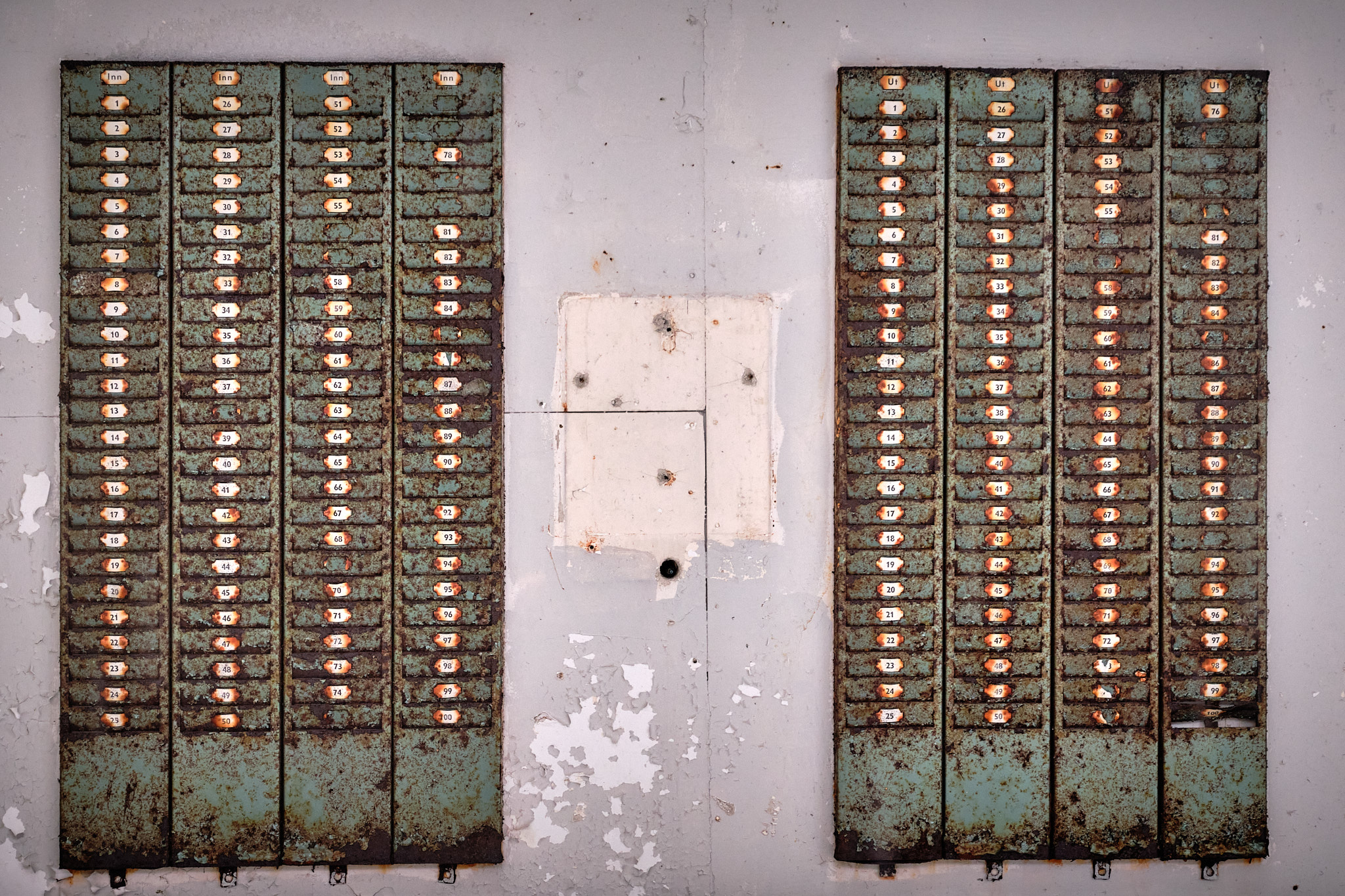 Sign in card holders inside the fish factory - Nordafar Abandoned fish factory near Nuuk