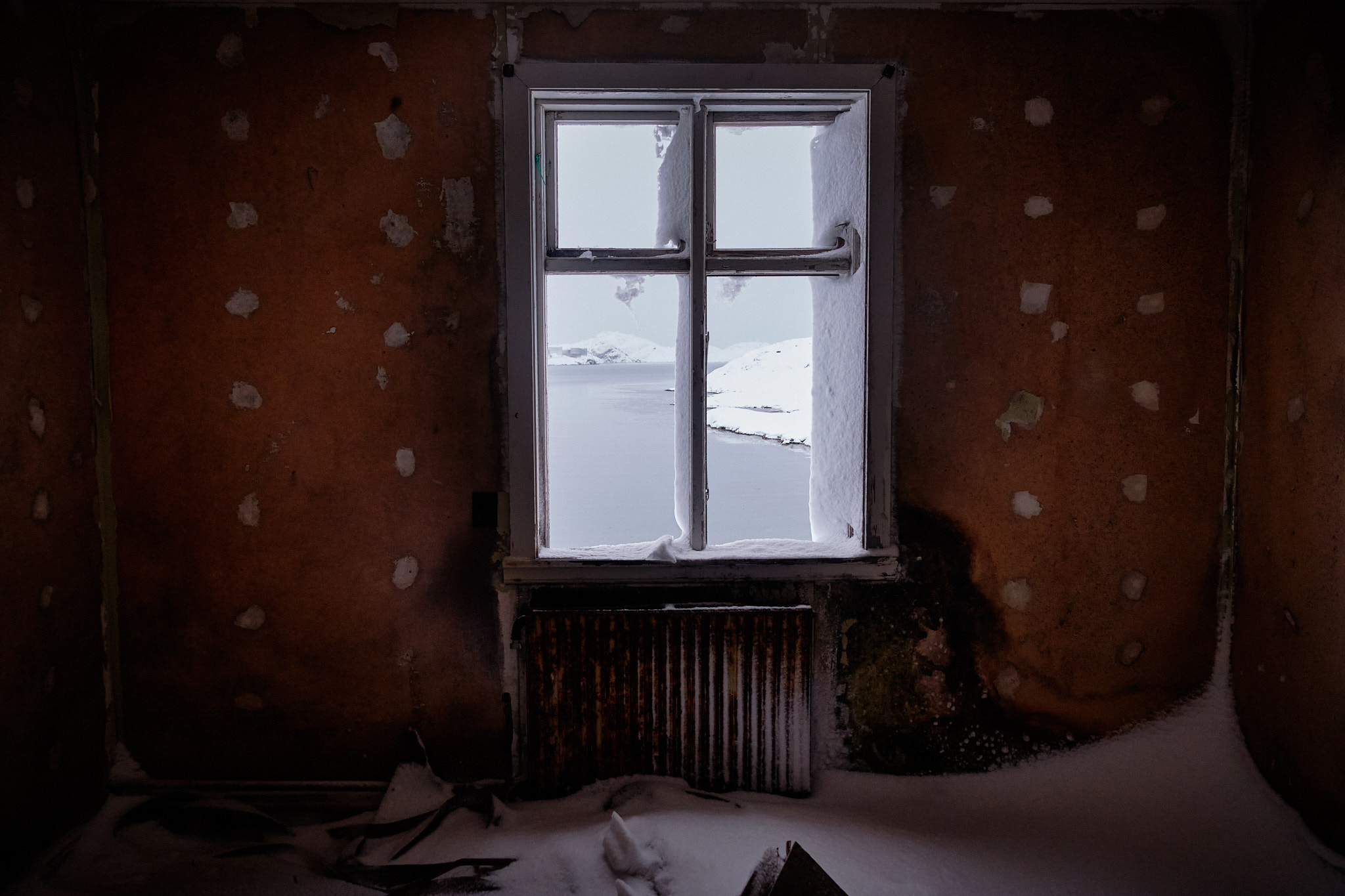 Window in Seamens Home - Nordafar Abandoned fish factory near Nuuk