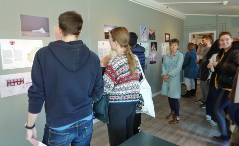 Guests at the opening of the In my backyard exhibition in Nuuk, Greenland