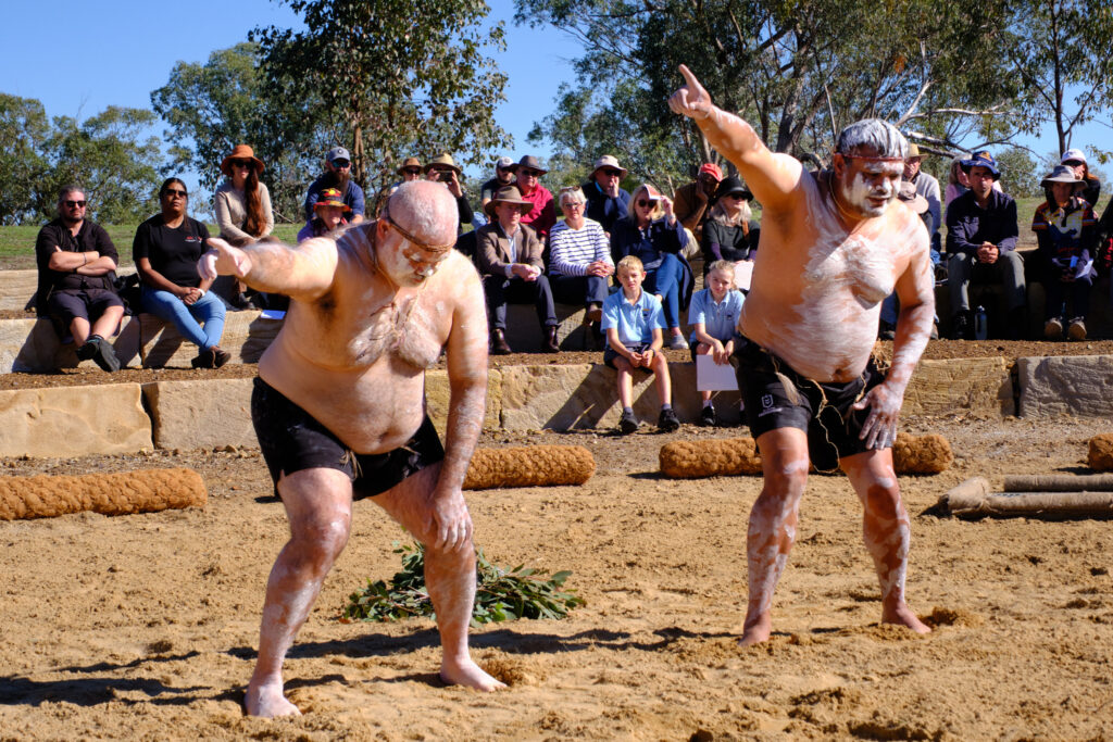 Performers from the Gomeroi Dance Company doing traditional dances at the 2026 Myall Memorial Creek Commemoration Ceremony